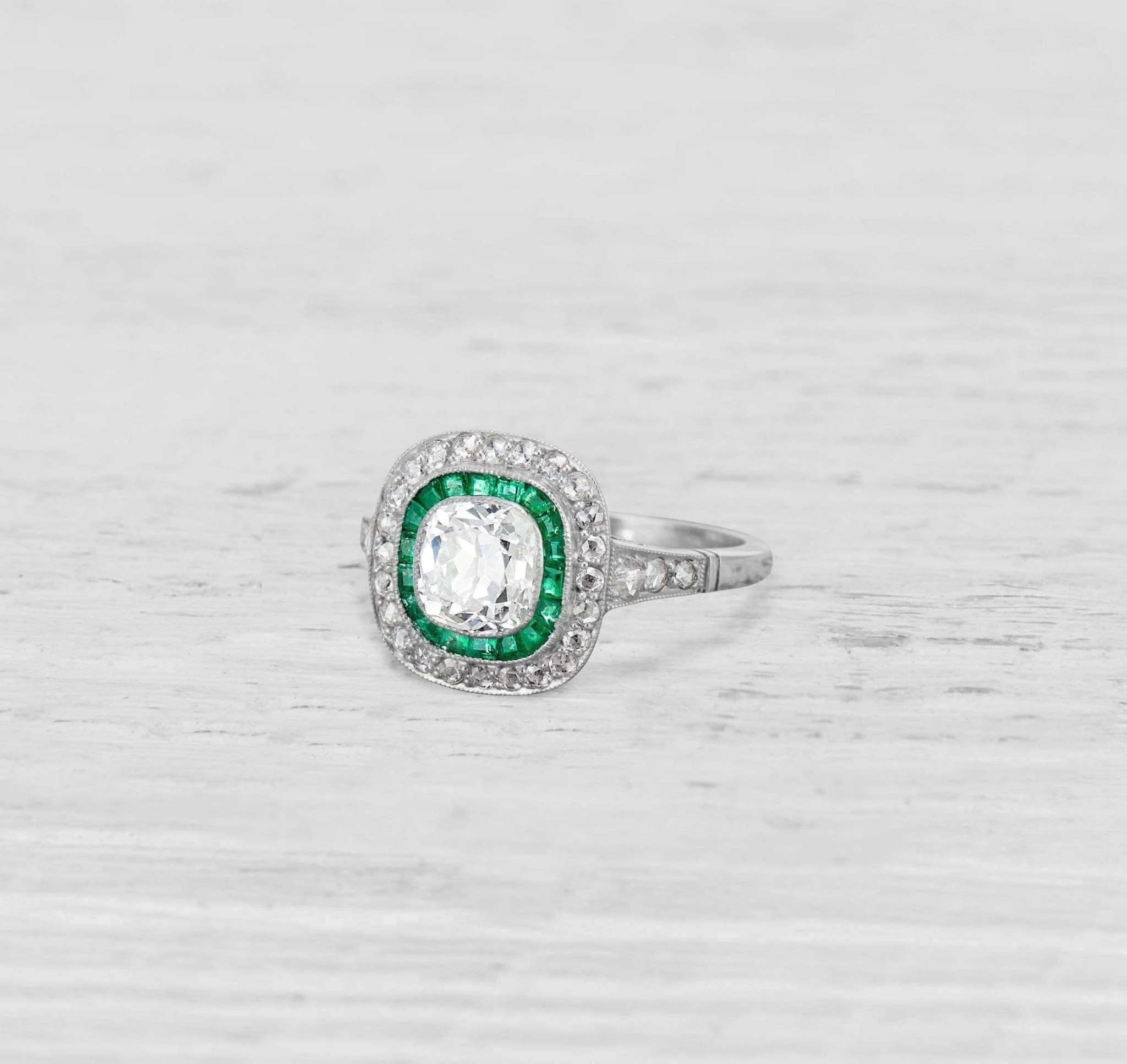 1.13 CARAT ART DECO DIAMOND AND EMERALD ENGAGEMENT RING