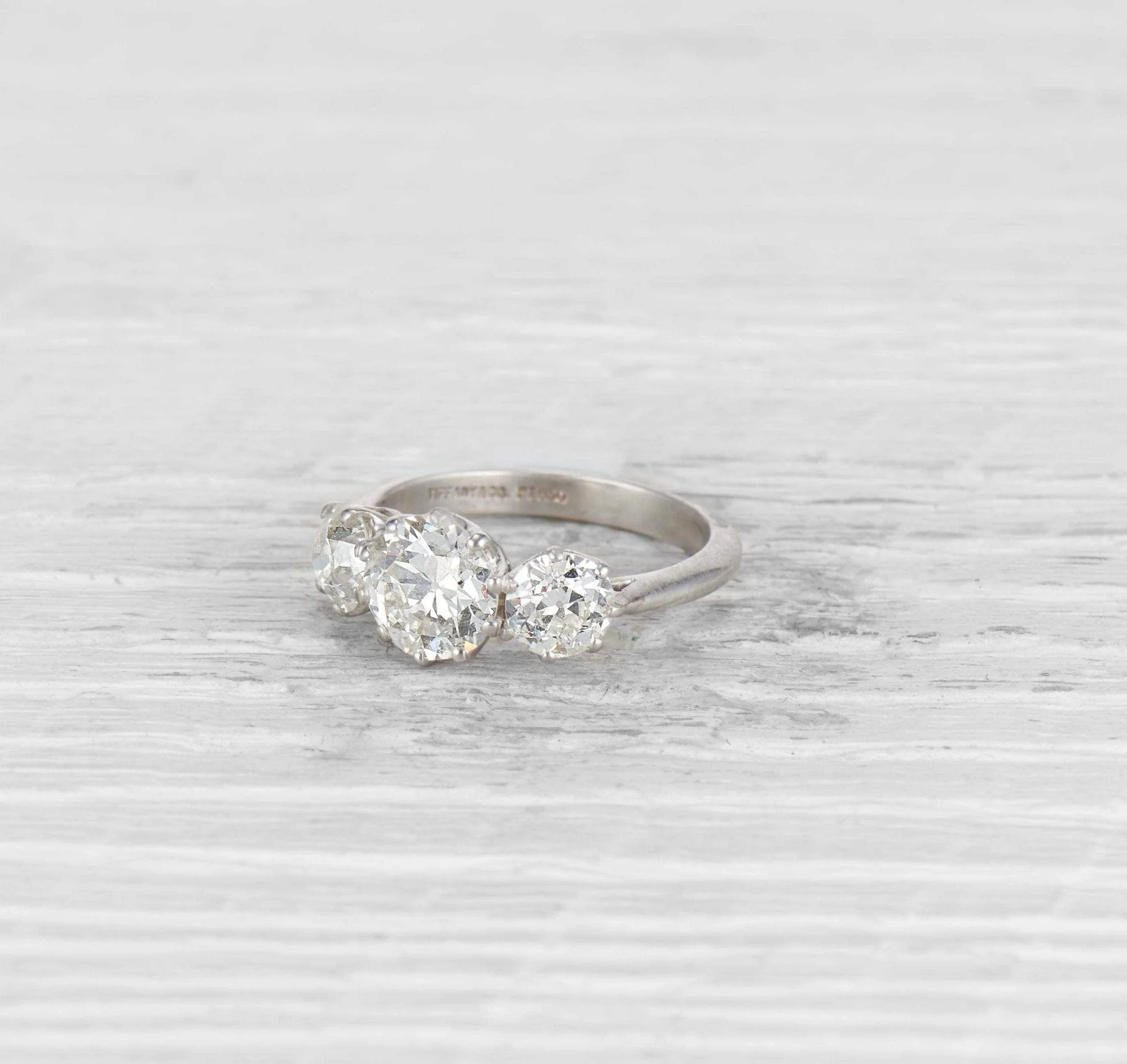 1.62 CARAT TIFFANY & CO. THREE STONE DIAMOND ENGAGEMENT RING