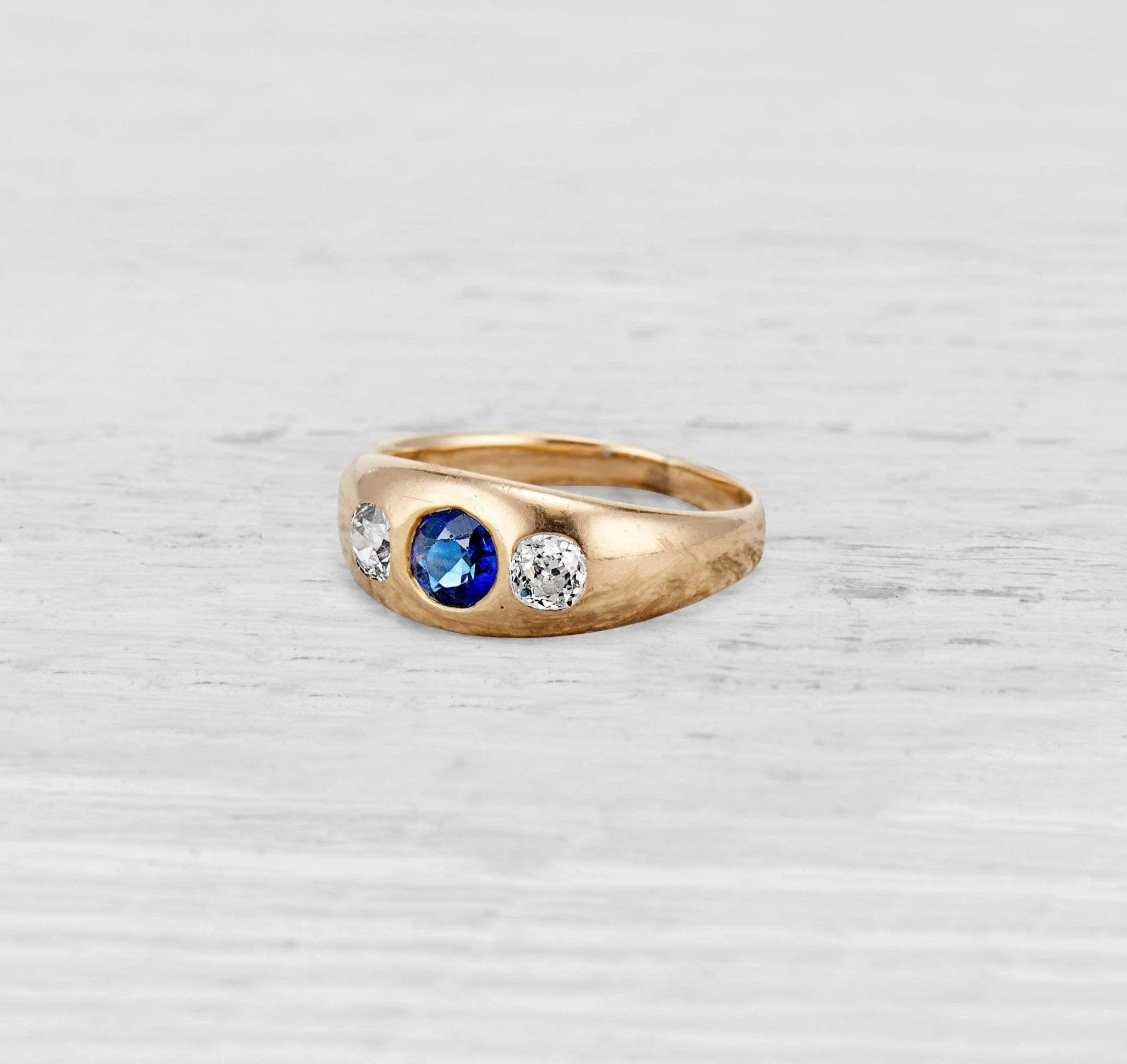 THREE STONE SAPPHIRE AND DIAMOND GYPSY RING